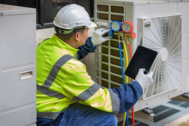 Professional Emergency Ac Repair technician working in Zavalla, TX